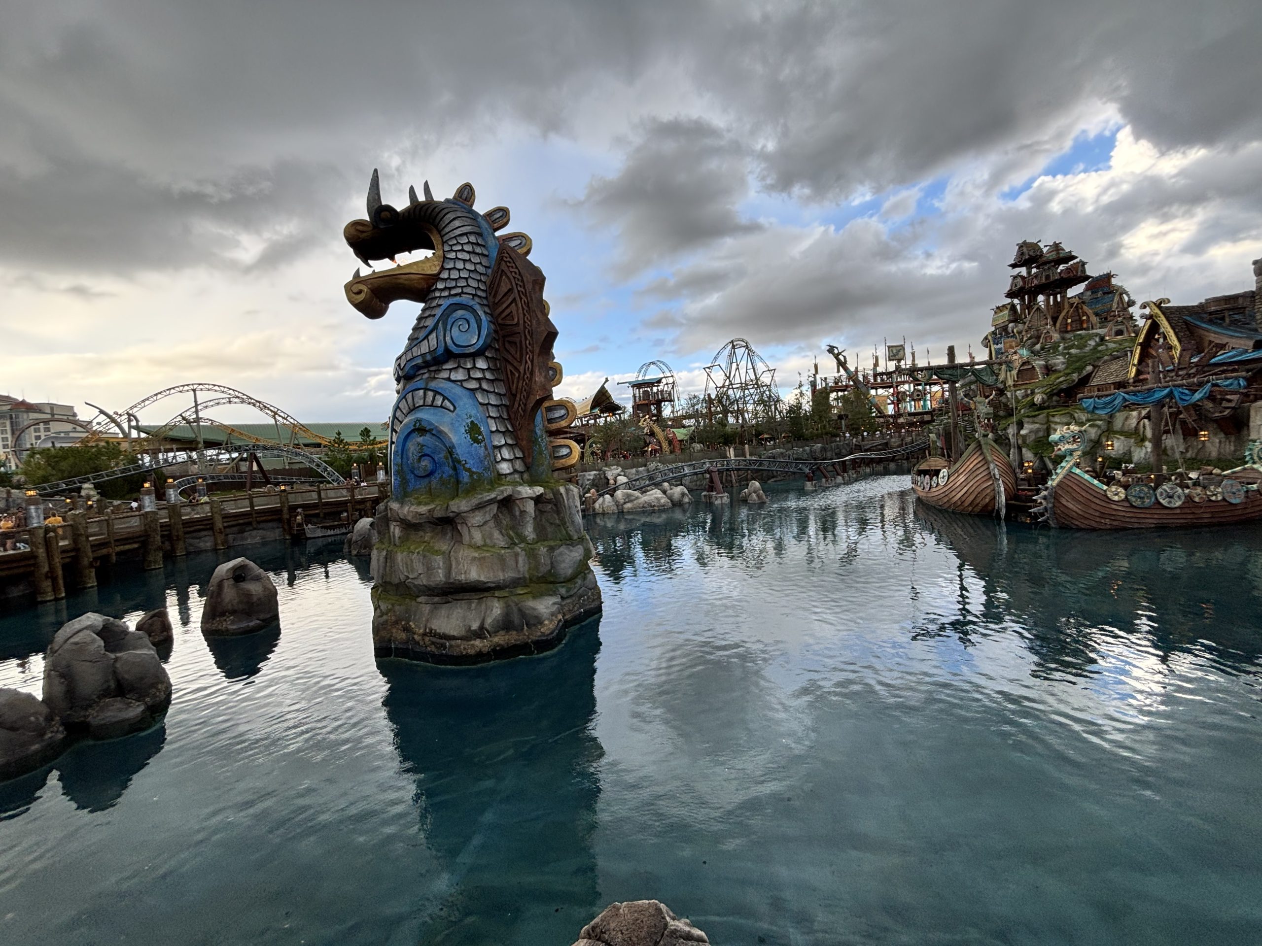 View of Pond at Isle of Berk at Epic Universe with Dragon head